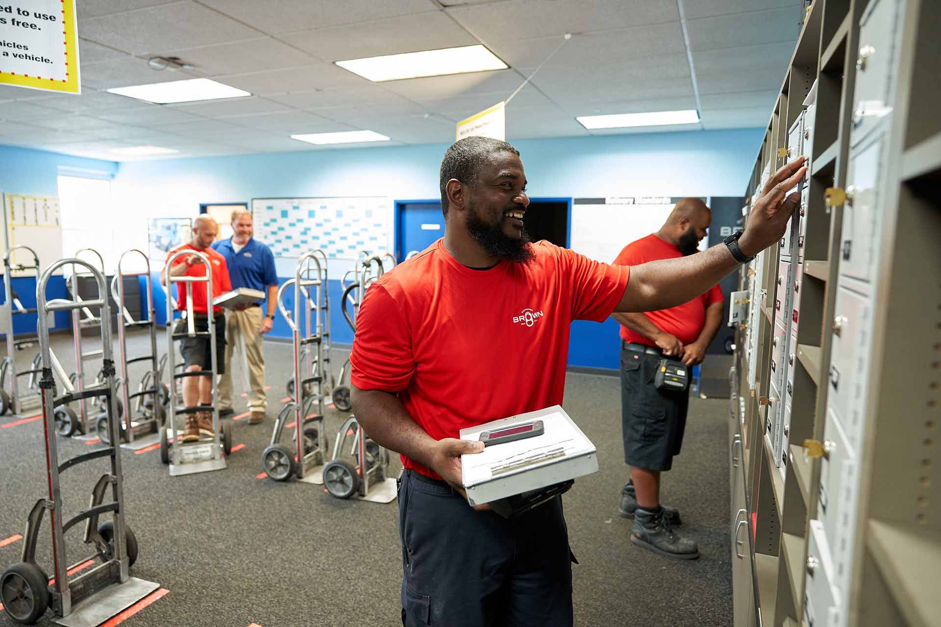 A Brown Distributing employee enjoying his work