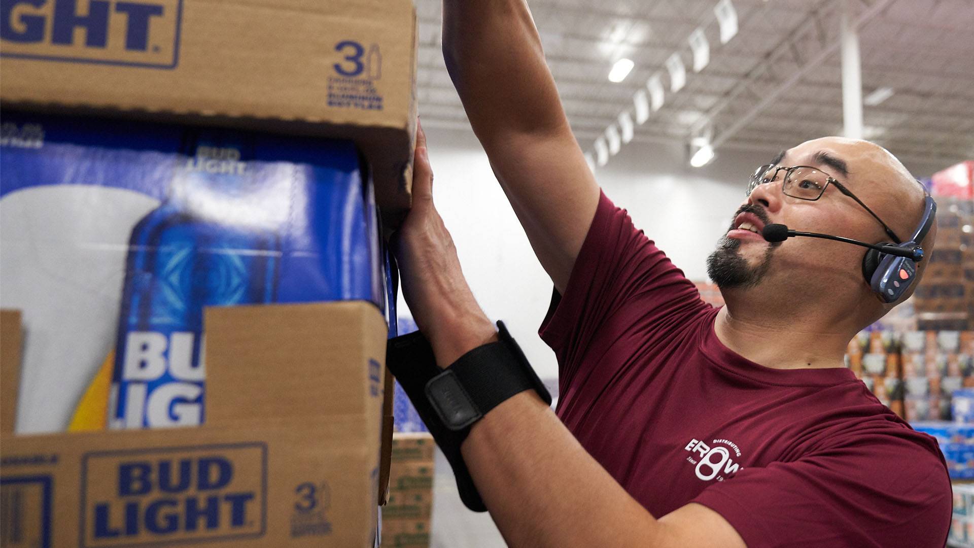 Brown Distributing's Team Working Together to lift beer into the truck